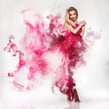 gorgeous-young-adult-blonde-pink-dress-smo-smoke-grey-background-40605227.jpg